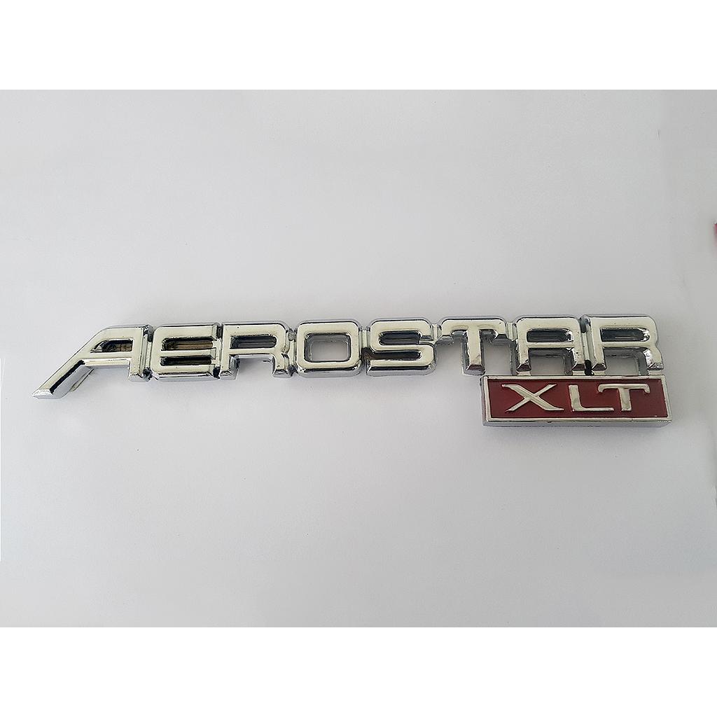 INSIGNIA ORIGINAL FORD AEROSTAR XLT LETRAS TRAS ( F-104)