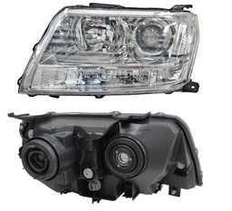 [SUGRA09FARTYL] FARO SUZUKI GRAND VITARA 09-17 C/CUARTO BCO FONDO CROM IZQ TYC (11192)