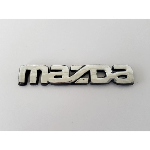 [SEMAZIN87LEL] INSIGNIA ORIGINAL MAZDA SEDAN DE 1987 AL 1989 LETRAS LAT ( M-003)